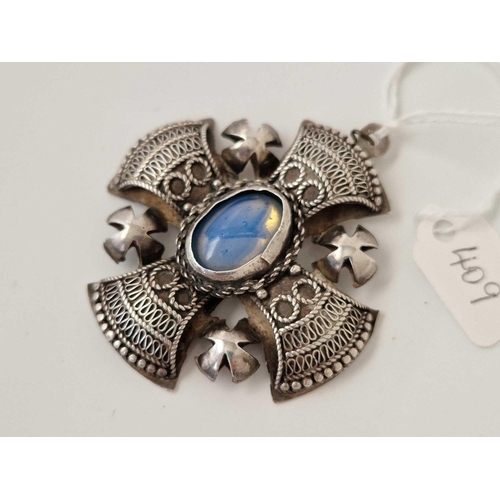 409 - A attractive silver Maltese cross shaped pendant with large opalite stone to centre