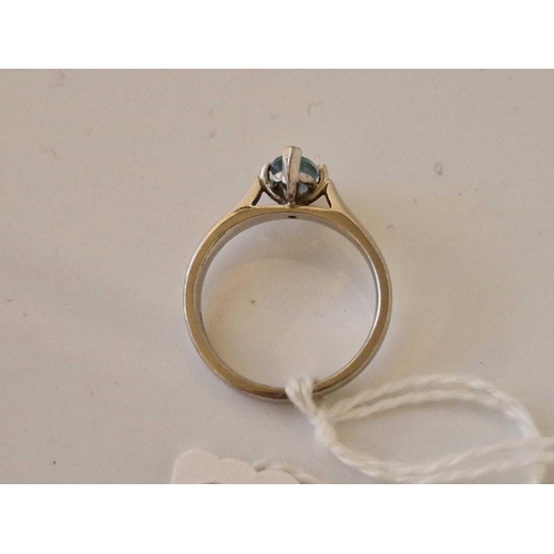 411 - A aquamarine ring 18ct gold size J 3.4 gms