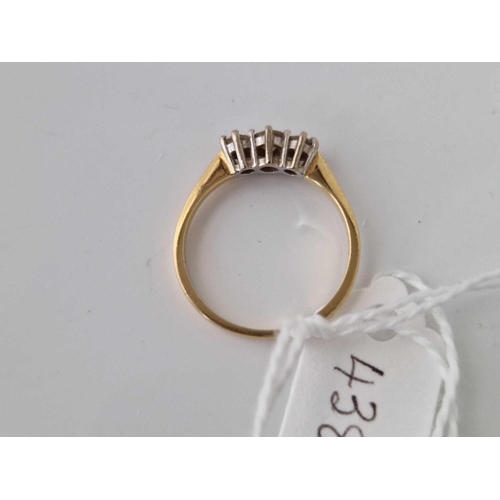 438 - A yellow gold three stone diamond ring 18ct gold size P 3.2 gms