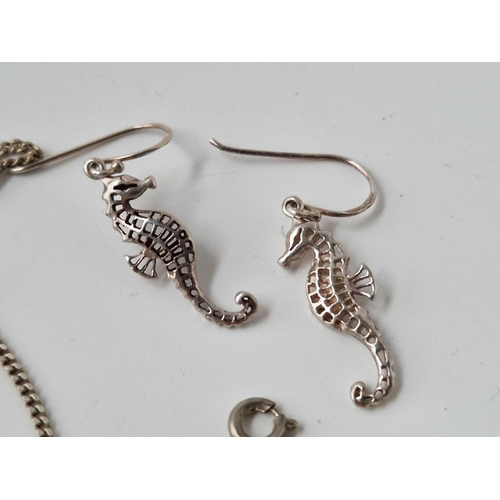 441 - A silver dolphin necklace ring and earrings and another silver ring