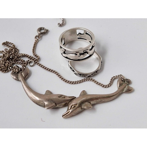 441 - A silver dolphin necklace ring and earrings and another silver ring