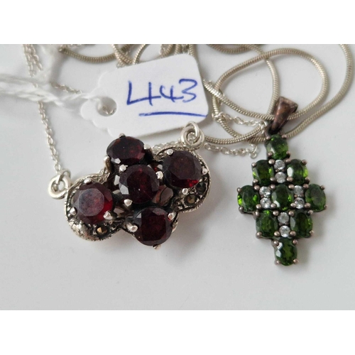 443 - A Sterling silver and garnet opening clasp necklace together with a Sterling silver and green stone ... 