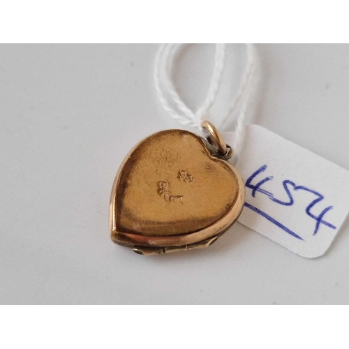 454 - A back and front heart locket 9ct 4.2 gms