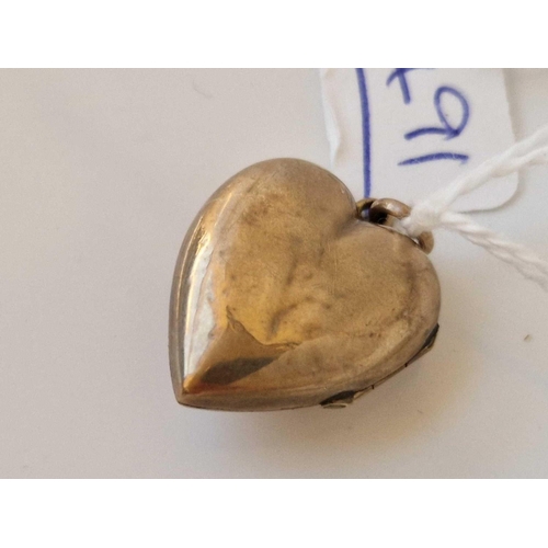 491 - A gold heart locket with pearls dented 3.4 gms