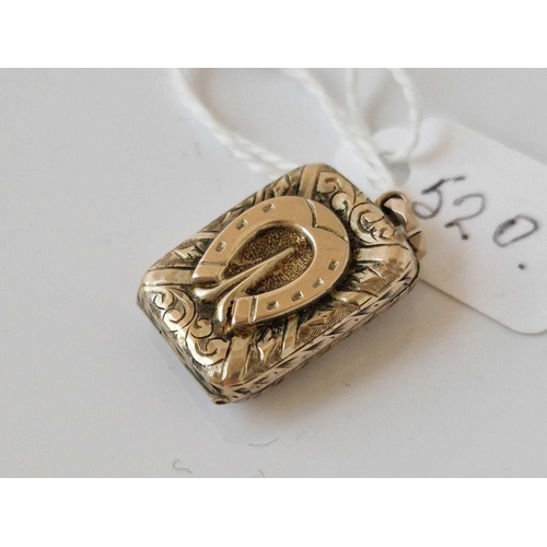 520 - A antique back and front locket with horse shoe