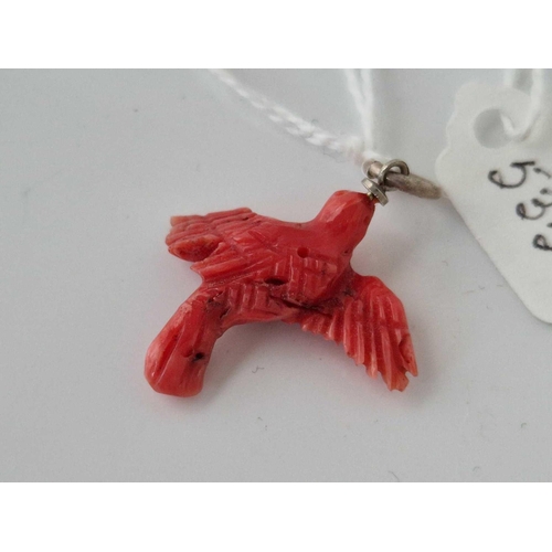 535 - A antique carved coral bird pendant