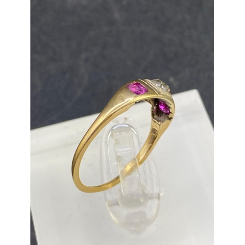 547 - An Antique Diamond set ring with Rubies Size L