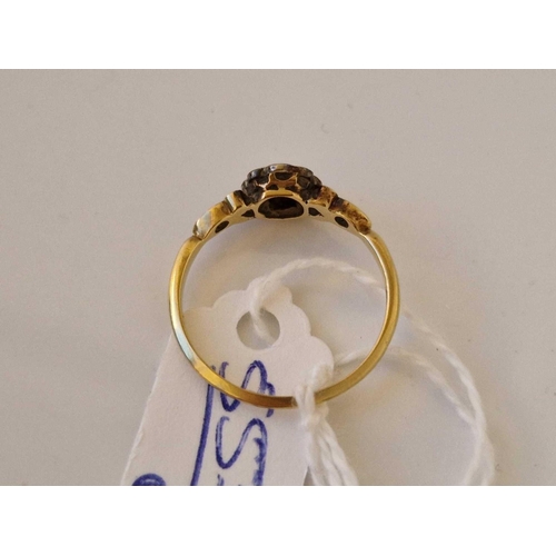 553 - A diamond cluster ring 18ct gold size Q 2.4 gms