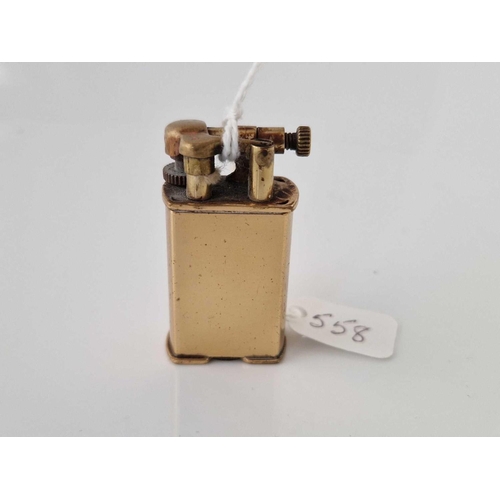 558 - A gilt metal lighter