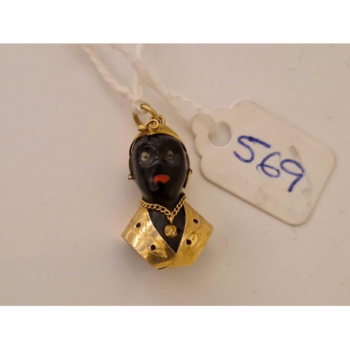 569 - A ethnic bust pendant 15ct gold