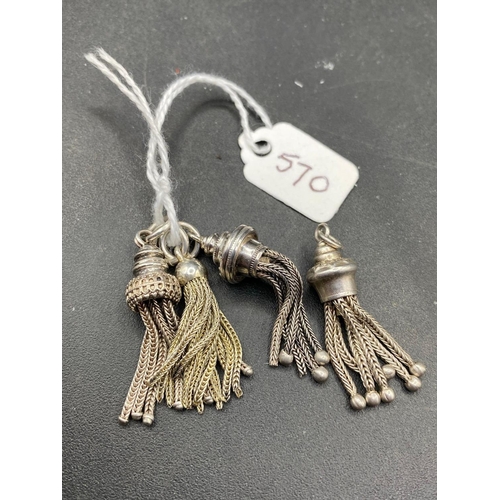 570 - 4 Antique silver tassels