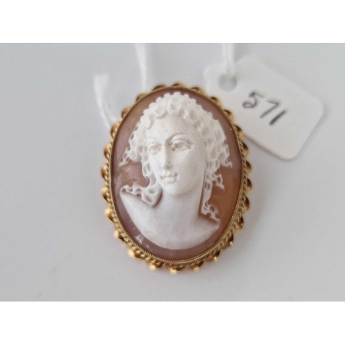 571 - A gold mounted high relief cameo brooch 9ct