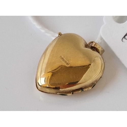 613 - A heart locket with diamond 9ct 2 gms