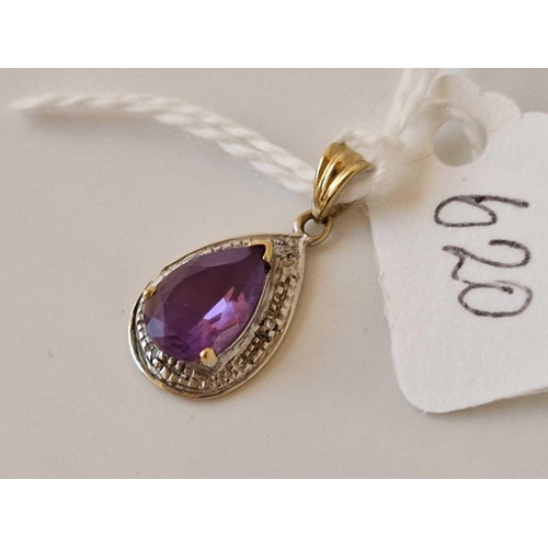 620 - A amethyst and diamond pendant 9ct