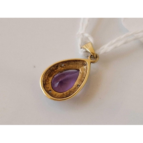 620 - A amethyst and diamond pendant 9ct