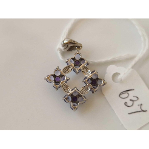 637 - A white gold pendant with amethyst and tanzanites 9ct 2.1 gms