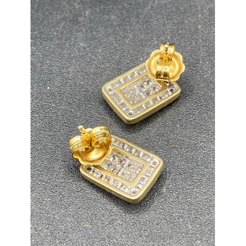 643 - A PAIR OF DIAMOND EARRINGS SET WITH SQUARE AND BAGUETTE DIAMONDS .90 CARATS 3.3 GMS BOXED