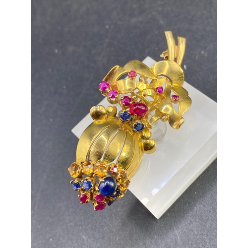 644 - A 1940s MULTI GEM FLOWER BROOCH SET WITH RUBIES SAPPHIRES AND TOPAZ IN HIGH CARAT GOLD 9.2g