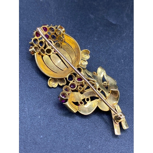 644 - A 1940s MULTI GEM FLOWER BROOCH SET WITH RUBIES SAPPHIRES AND TOPAZ IN HIGH CARAT GOLD 9.2g