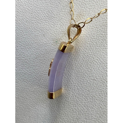 649 - A lilac jade good fortune pendant 9ct on gold chain 9