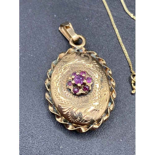 65 - An antique ruby set 9ct locket on 9ct chain 3.8g