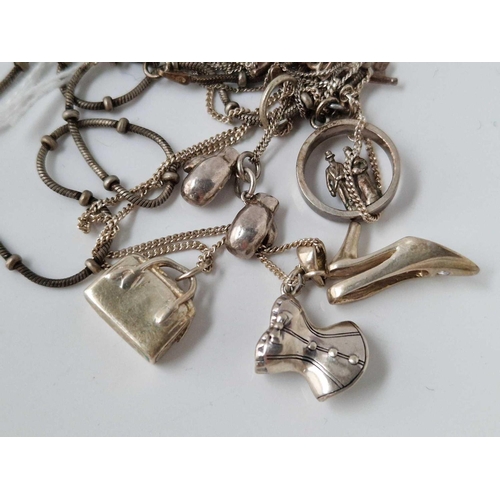 663 - Three silver charm necklaces