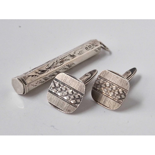 665 - A silver holder and a pair of silver cufflinks