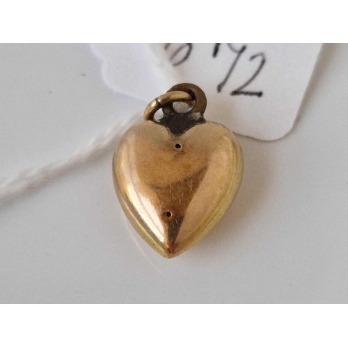 672 - A antique heart charm with ruby 15ct gold 1.7 gms