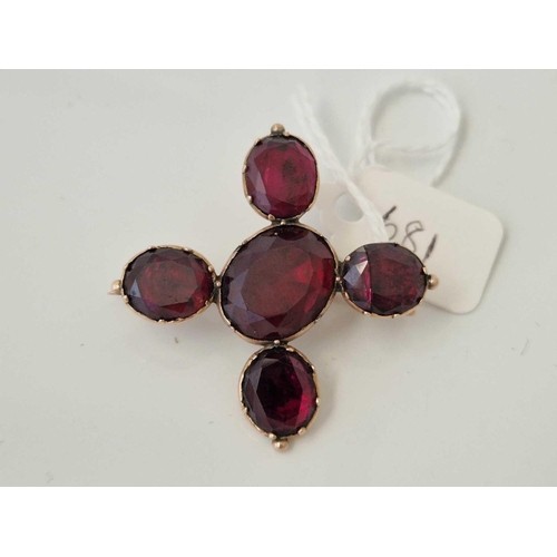 681 - A 19th century garnet and gold brooch