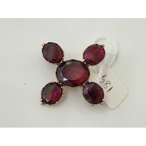 681 - A 19th century garnet and gold brooch