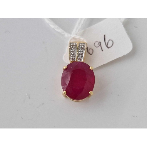 696 - A synthetic ruby and diamond pendant 4.6 gms