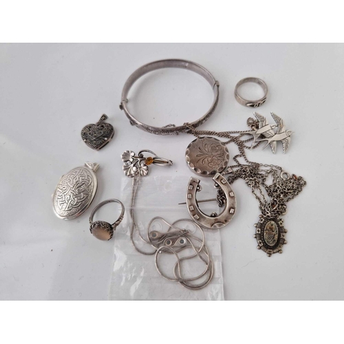 707 - A bag of assorted silver jewellery inc. bangles locket rings etc. 55 gms