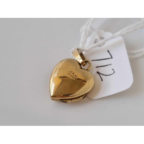 712 - A heart locket 9ct 1.8 gms