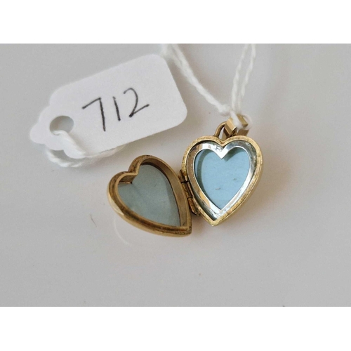 712 - A heart locket 9ct 1.8 gms