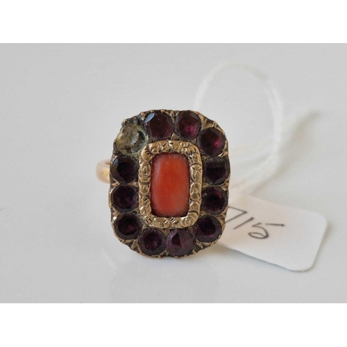 715 - A 19th century coral and garnet ring set in gold stone missing size P 6.2 gms