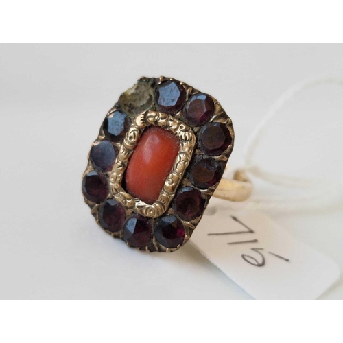 715 - A 19th century coral and garnet ring set in gold stone missing size P 6.2 gms