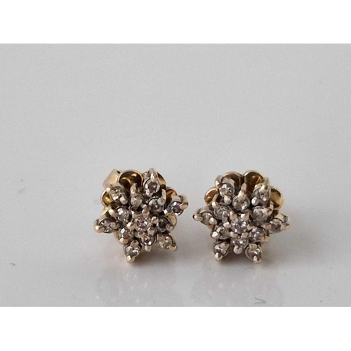 717 - A pair of diamond cluster ear studs 9ct