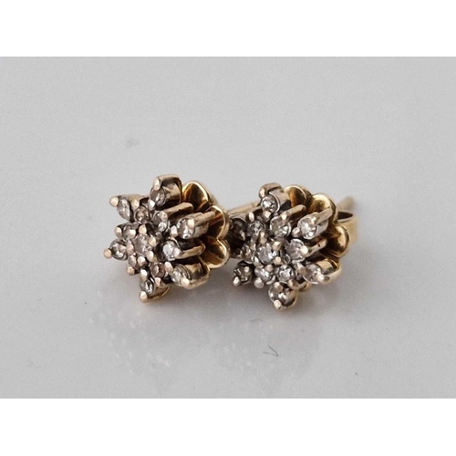 717 - A pair of diamond cluster ear studs 9ct