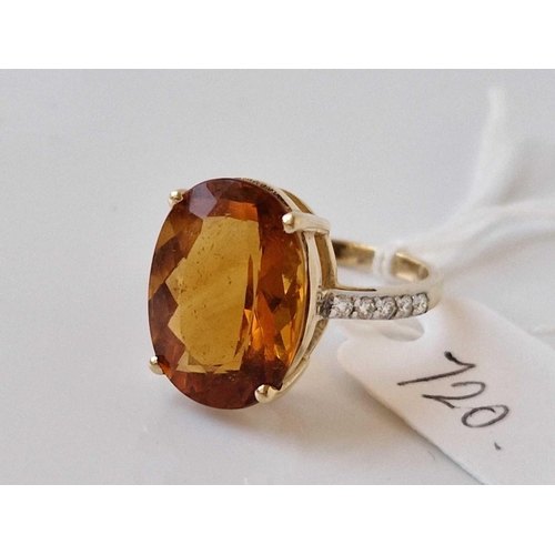 720 - A orange stone and diamond ring size O 14ct gold 4.9 gms