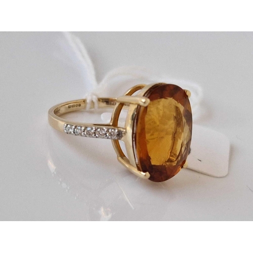 720 - A orange stone and diamond ring size O 14ct gold 4.9 gms