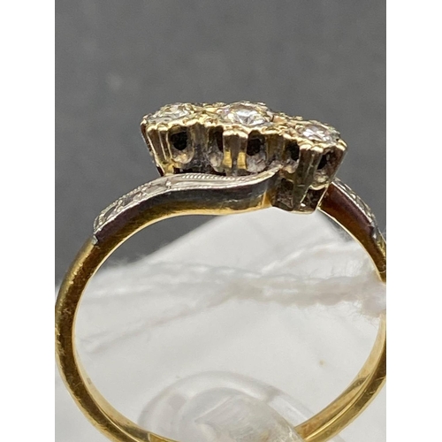 73 - An Edwardian three stone diamond ring 18ct sz V 2.5g