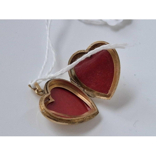 733 - Antique 9ct rolled gold back and front heart locket