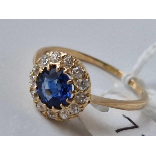 736 - Antique Edwardian 18ct and diamond cluster ring set with a central blue sapphire coloured gem, size,... 