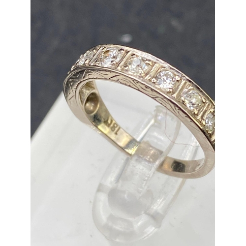 746 - A DIAMOND HALF ETERNITY RING SET WITH BRILLIANT CUT DIAMONDS 18CT GOLD