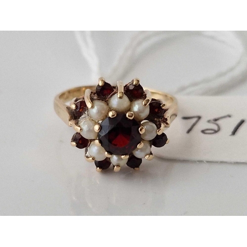 751 - A pearl and garnet ring 9ct size H 2.4 gms