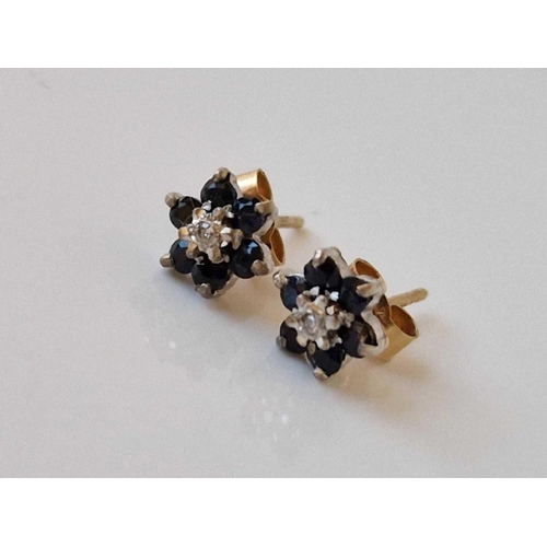 773 - A pair of sapphire cluster and diamond ear studs 9ct