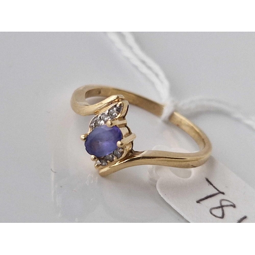 781 - A tanzanite and diamond ring 14c gold size U 3.3 gms