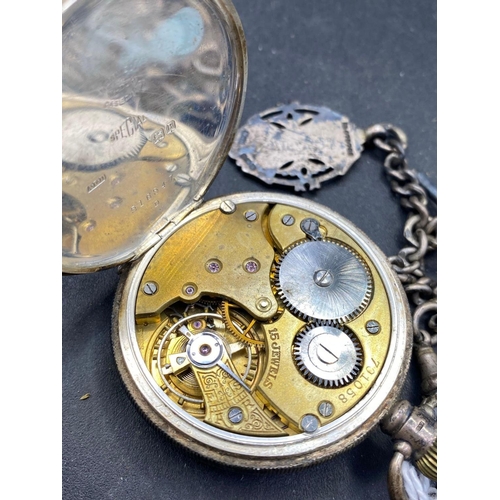 817 - A silver pocket watch with silver albert chain 14 inch