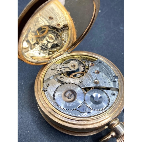 841 - A rolled gold WALTHAM hunter gents pocket watch with seconds dial