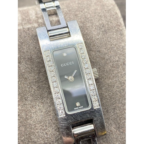 851 - A cased ladies GUCCI dress watch